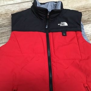 Boys north face vest.  Black/Red